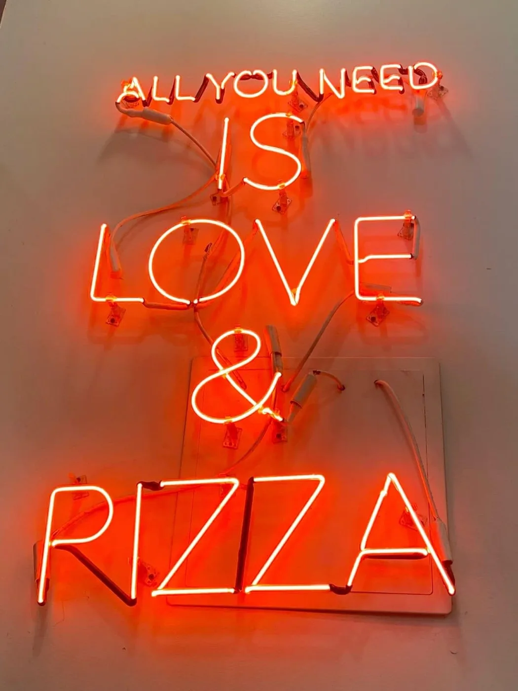 "All you need is love & pizza" neon sign